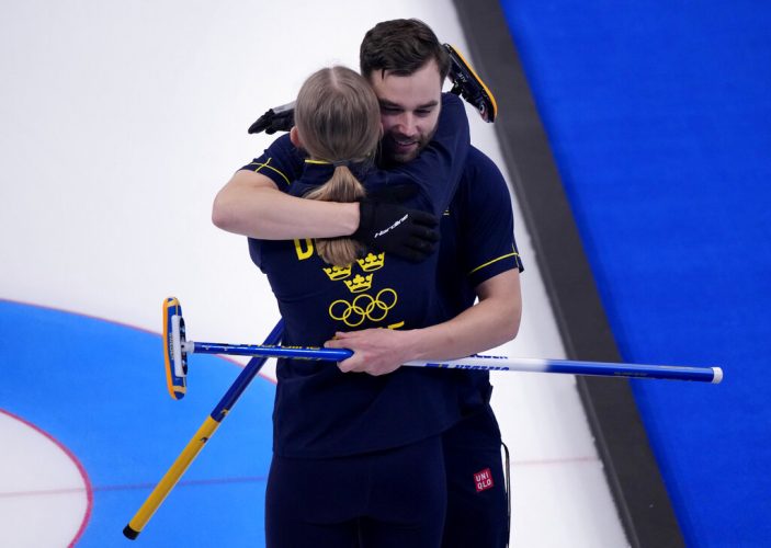 Sweden beats Britain 9-3, wins Olympic mixed curling bronze